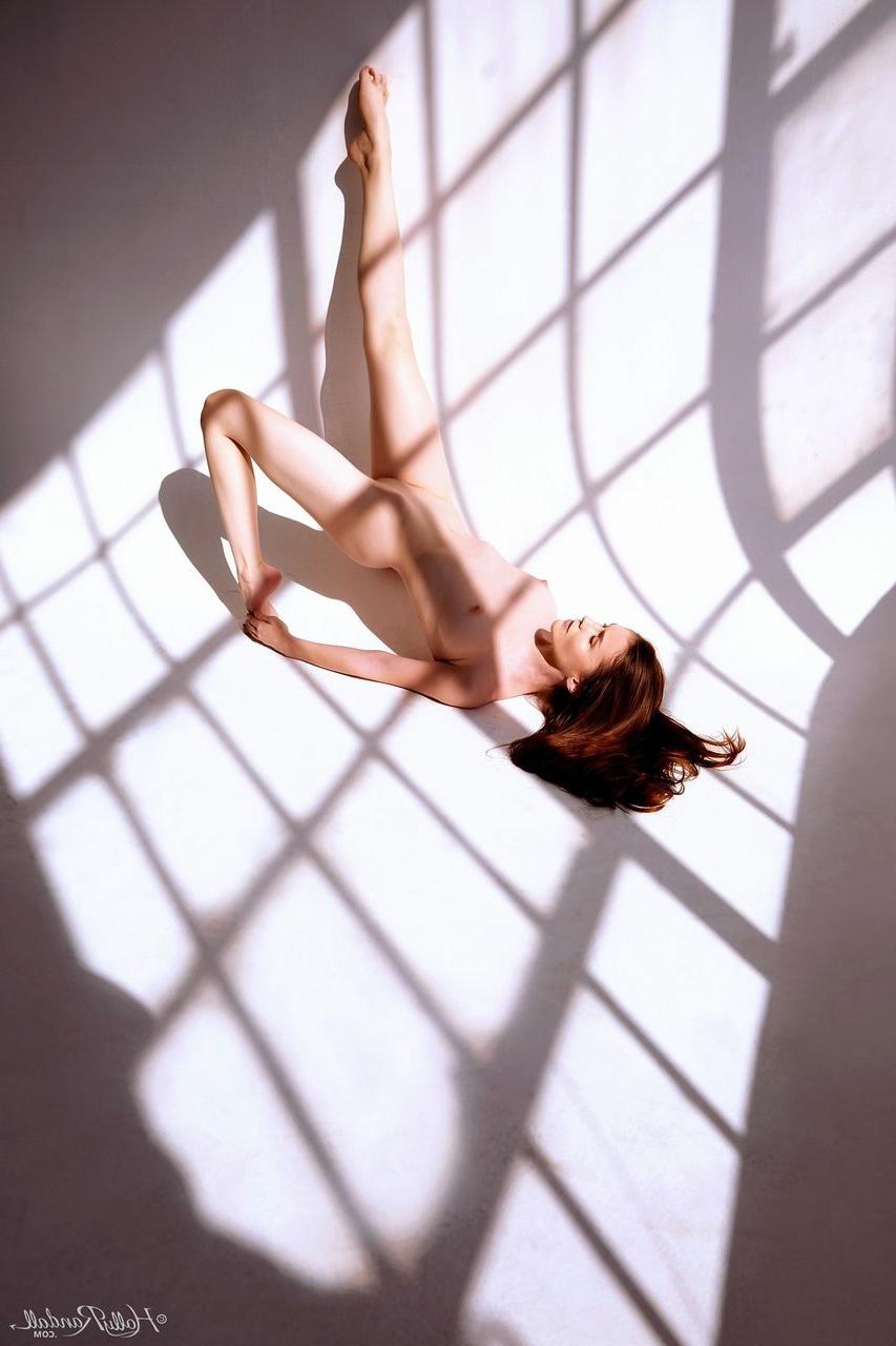 12P Hot redhead Emily Bloom displays her flexibility during a nude centerfold gig