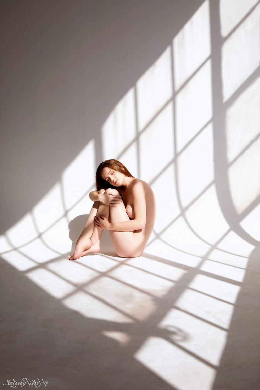 12P Hot redhead Emily Bloom displays her flexibility during a nude centerfold gig