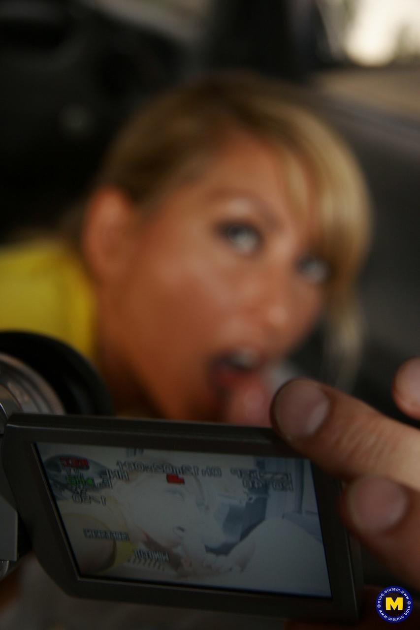 20P Horny blonde MILF Anouk sucks a stiff rod and collects white semen in a car