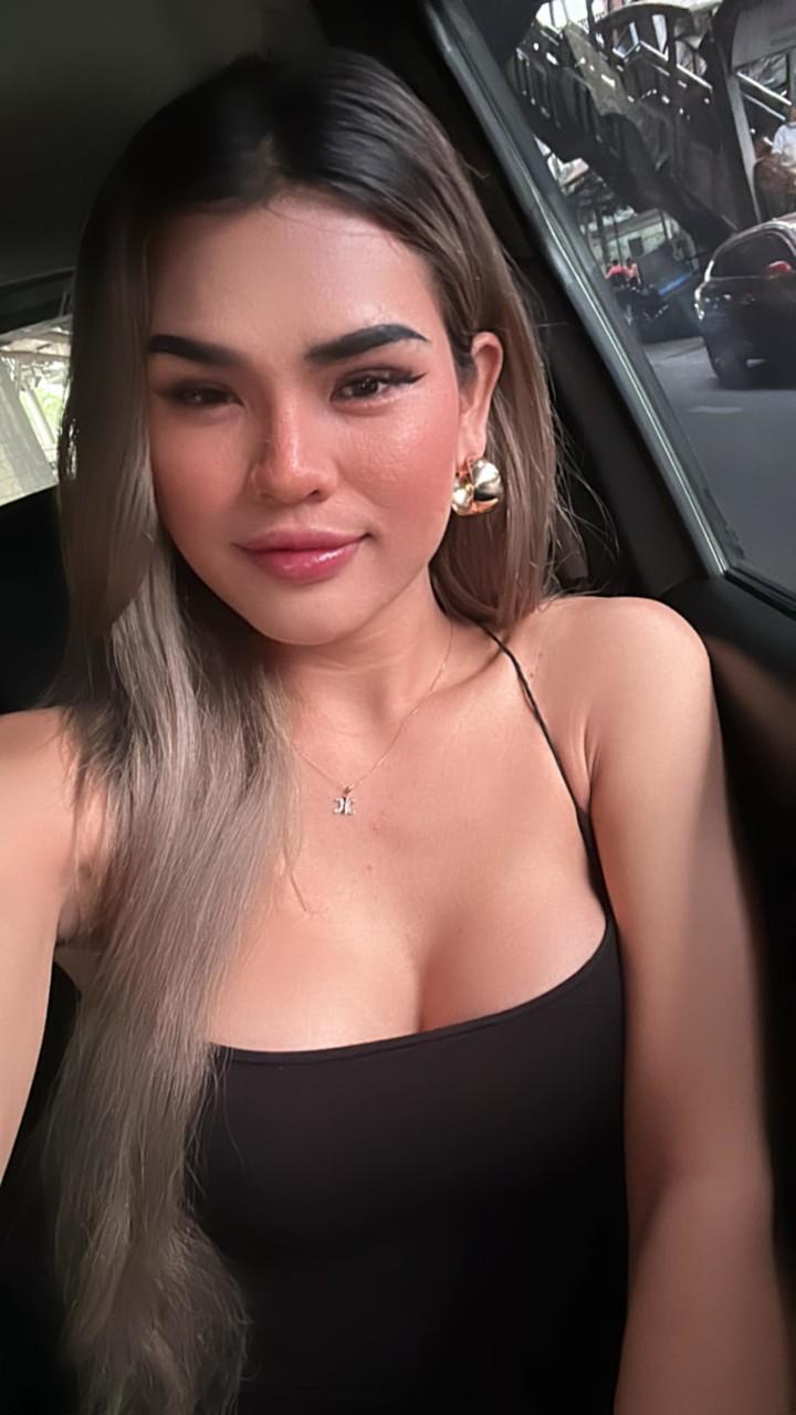 11P Glamorous OnlyFans babe Petite Trans Beauty poses in her black dress in a solo