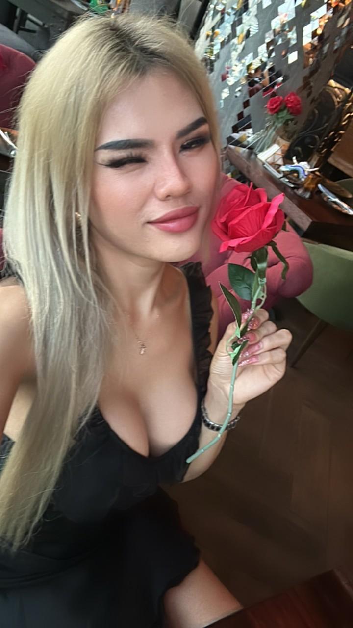 11P Glamorous OnlyFans babe Petite Trans Beauty poses in her black dress in a solo