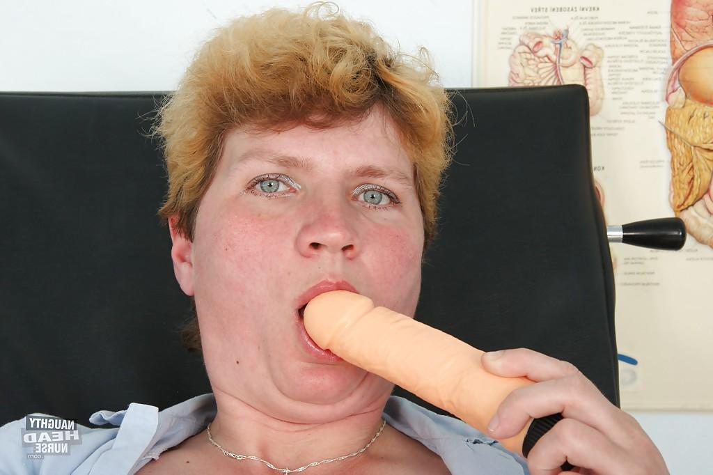 16P Chubby mature nurse with massive flabby jugs toying her cunt