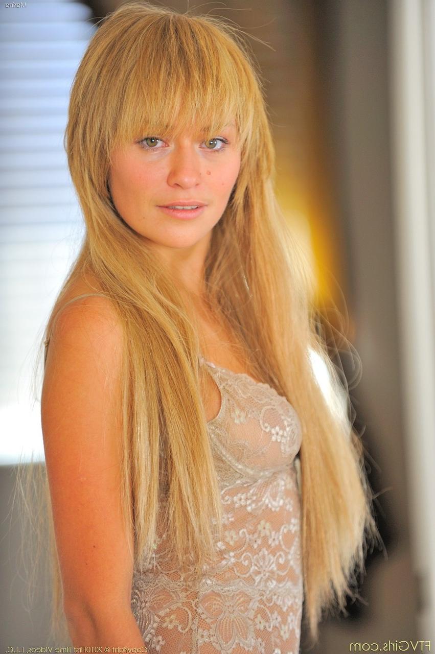 20P Blonde babe with a beautiful smile Marina exposing her sweet natural tits