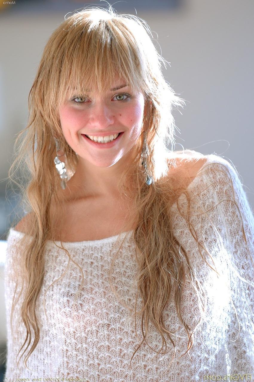 20P Blonde babe with a beautiful smile Marina exposing her sweet natural tits