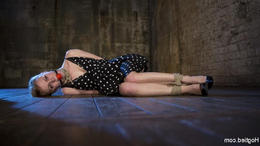 15P Tattooed blonde Anna Tyler is tied up and ball gagged before being masturbated