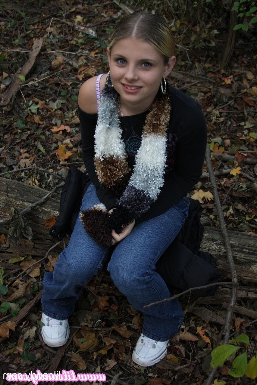 16P Adorable babe Lil Candy stripping in the forest and showing her puffy pussy