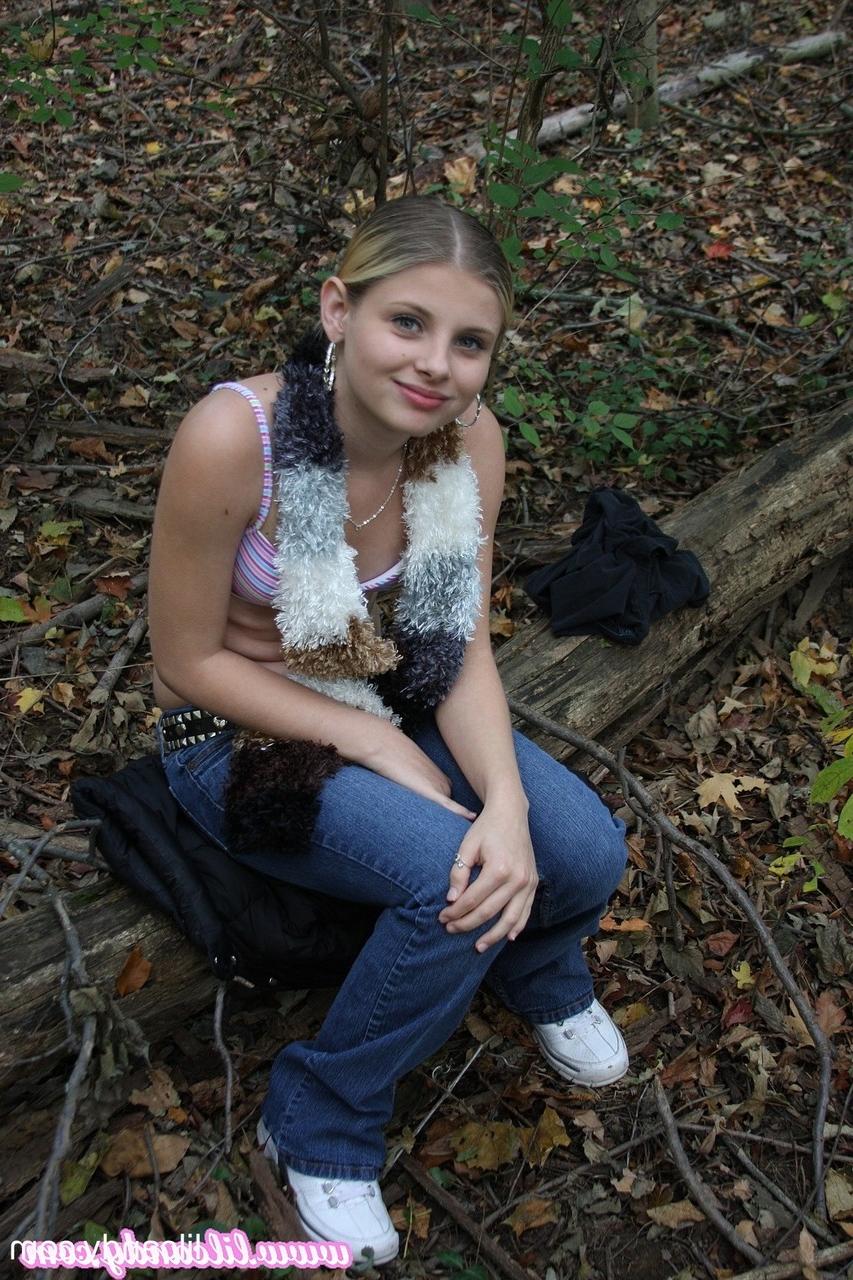16P Adorable babe Lil Candy stripping in the forest and showing her puffy pussy