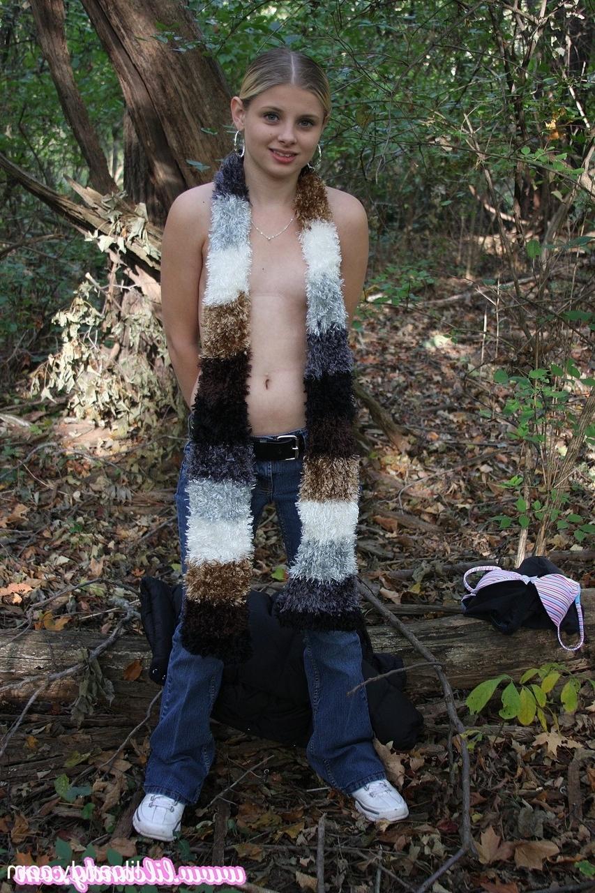 16P Adorable babe Lil Candy stripping in the forest and showing her puffy pussy