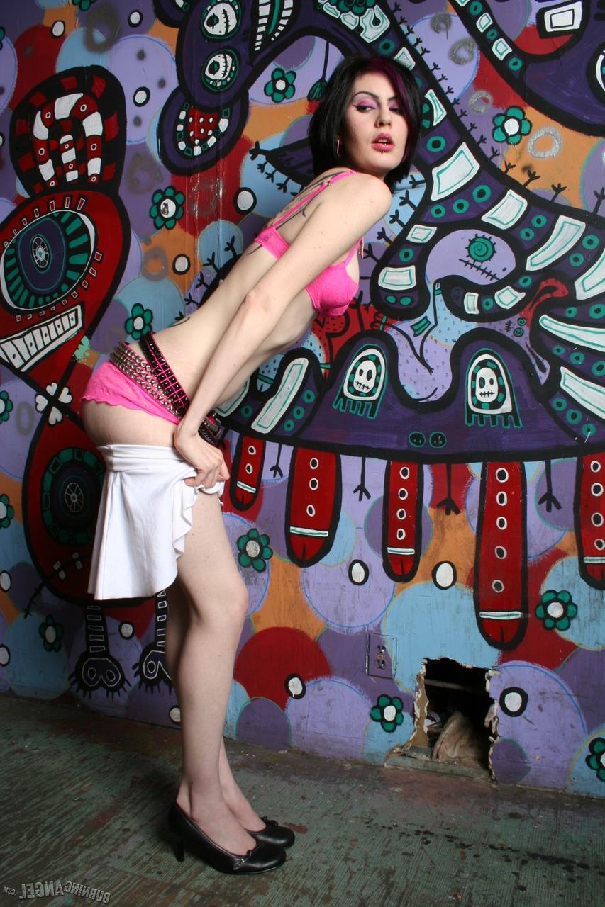 18P Slim tiny titted fetish model doffs her bra & toys pussy with Halloween props