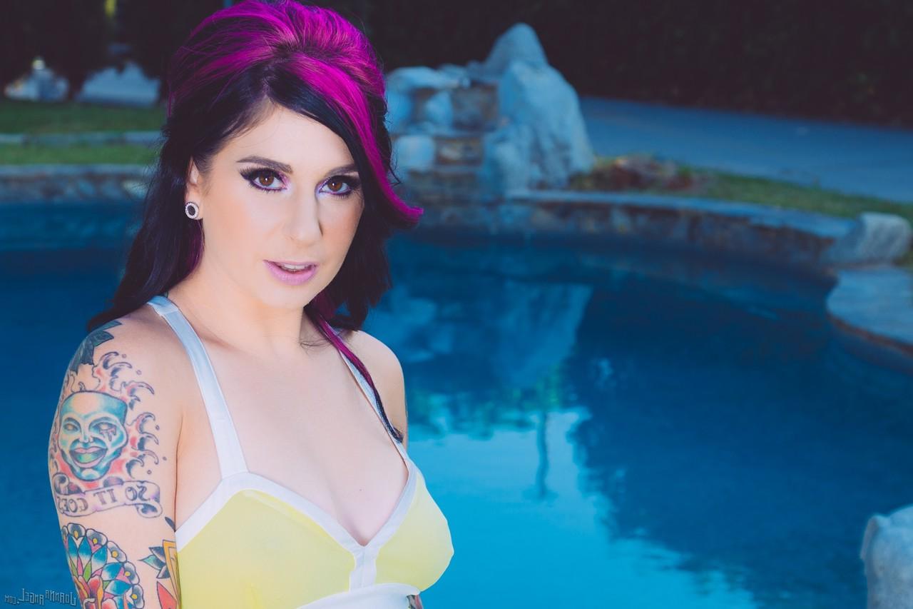 15P Amateur MILF Joanna Angel exposing heavily tattooed body next to pool