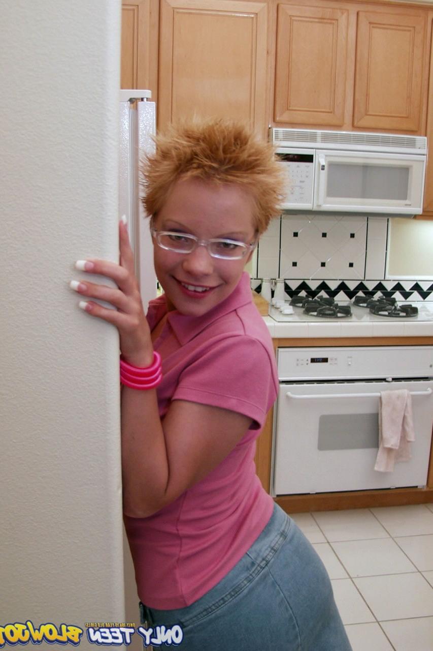 20P Naughty redhead Emily Davinci goes topless & indulges in a food play solo