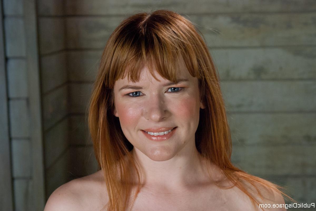 20P Redheaded mature Claire Robbins shows her hot ass and small tits in a solo