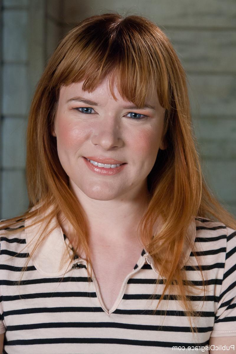 20P Redheaded mature Claire Robbins shows her hot ass and small tits in a solo