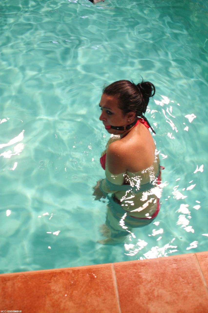 18P Pretty fatty Erika ball gagged & bound with duct tape falls into the pool