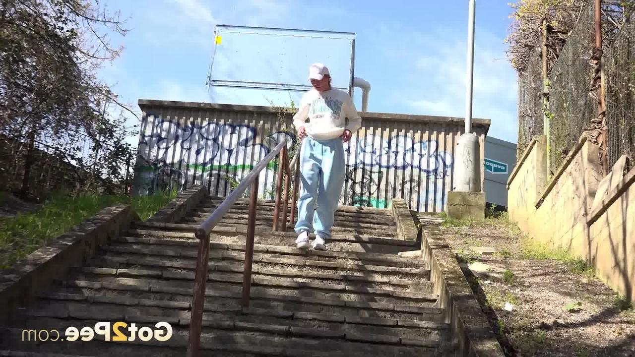 14P Caucasian chick Claudia Macc gets caught taking a piss on a flight of steps