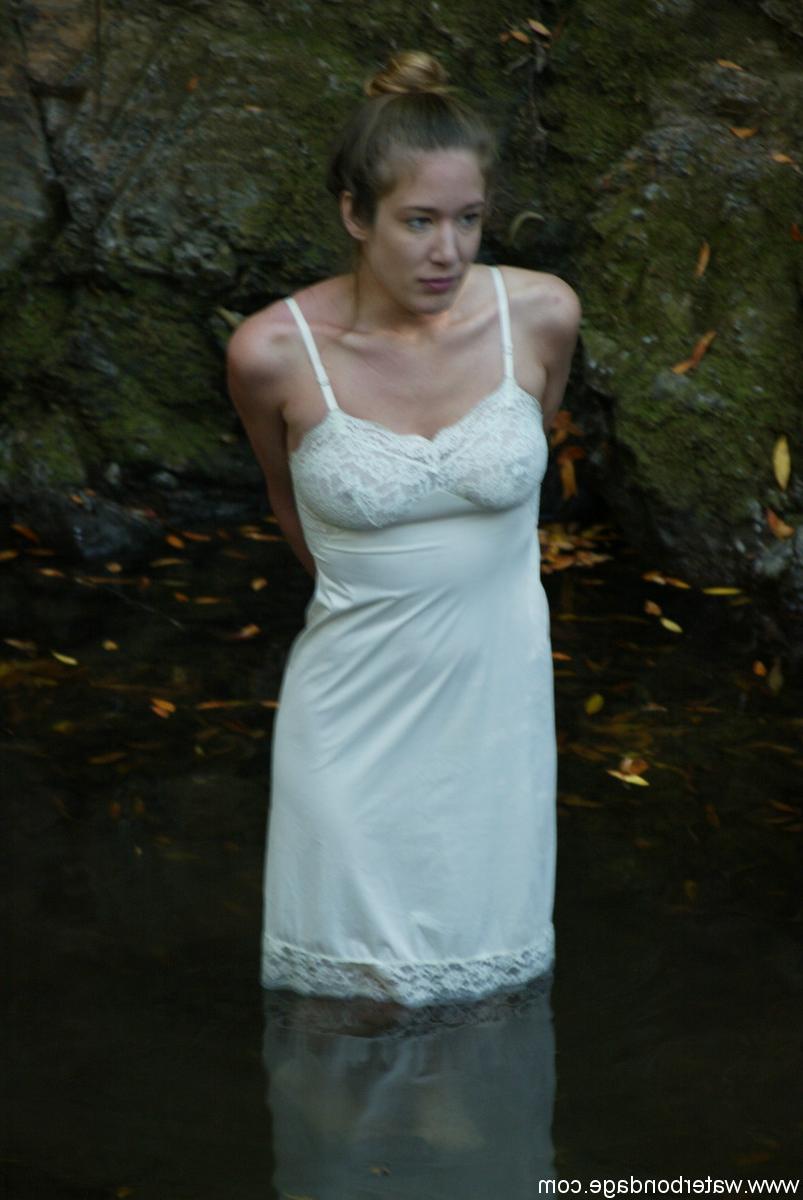 20P Busty virgin gets schooled by a blonde lezdom in outdoor water bondage action