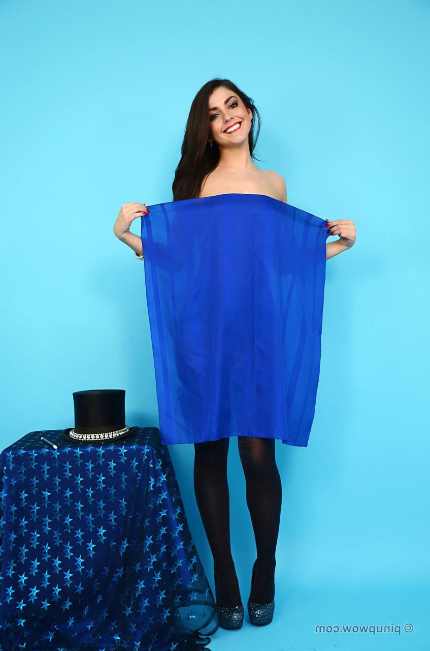 17P Pinup model Bryoni-Kate goes topless in a magician's hat and black stockings