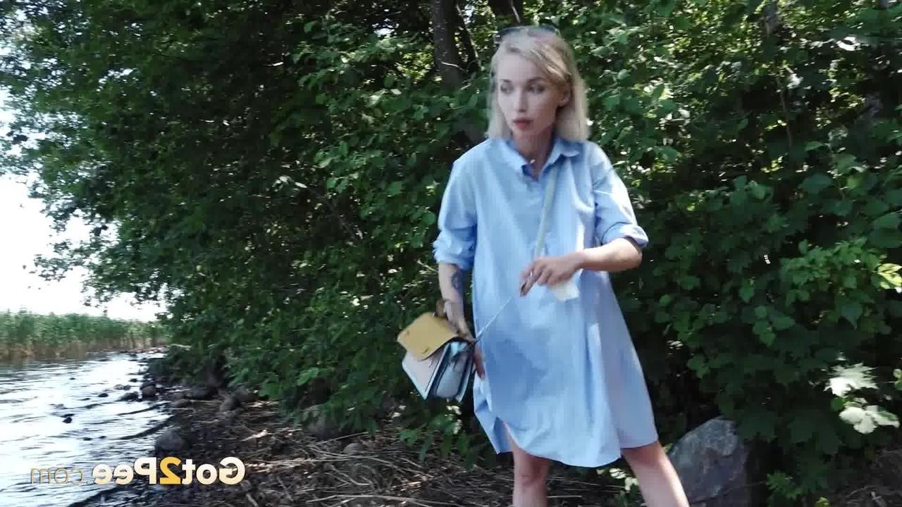 15P Petite blonde Masha squats for an urgent piss by riverside bushes