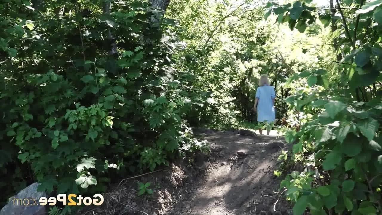 15P Petite blonde Masha squats for an urgent piss by riverside bushes