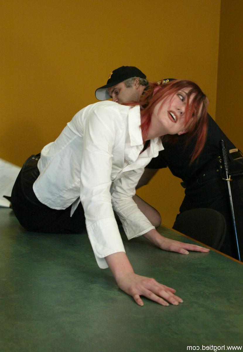 19P Redheaded MILF Kendra James endures rough handling & spanking by a cop