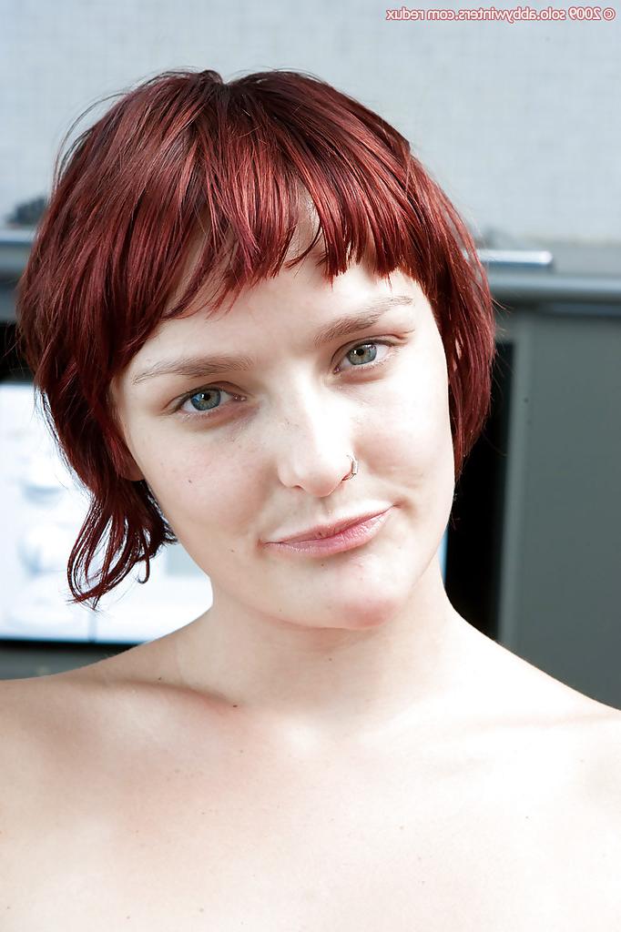 16P Redhead first timer Katarina removes pants and panties to spread hairy bush