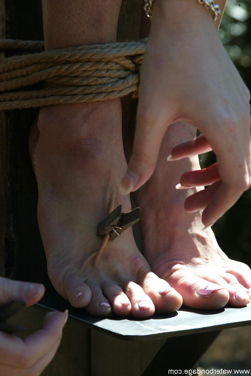 20P Naked brunette Venus gets whipped & toyed during an outdoor crucifixion scene