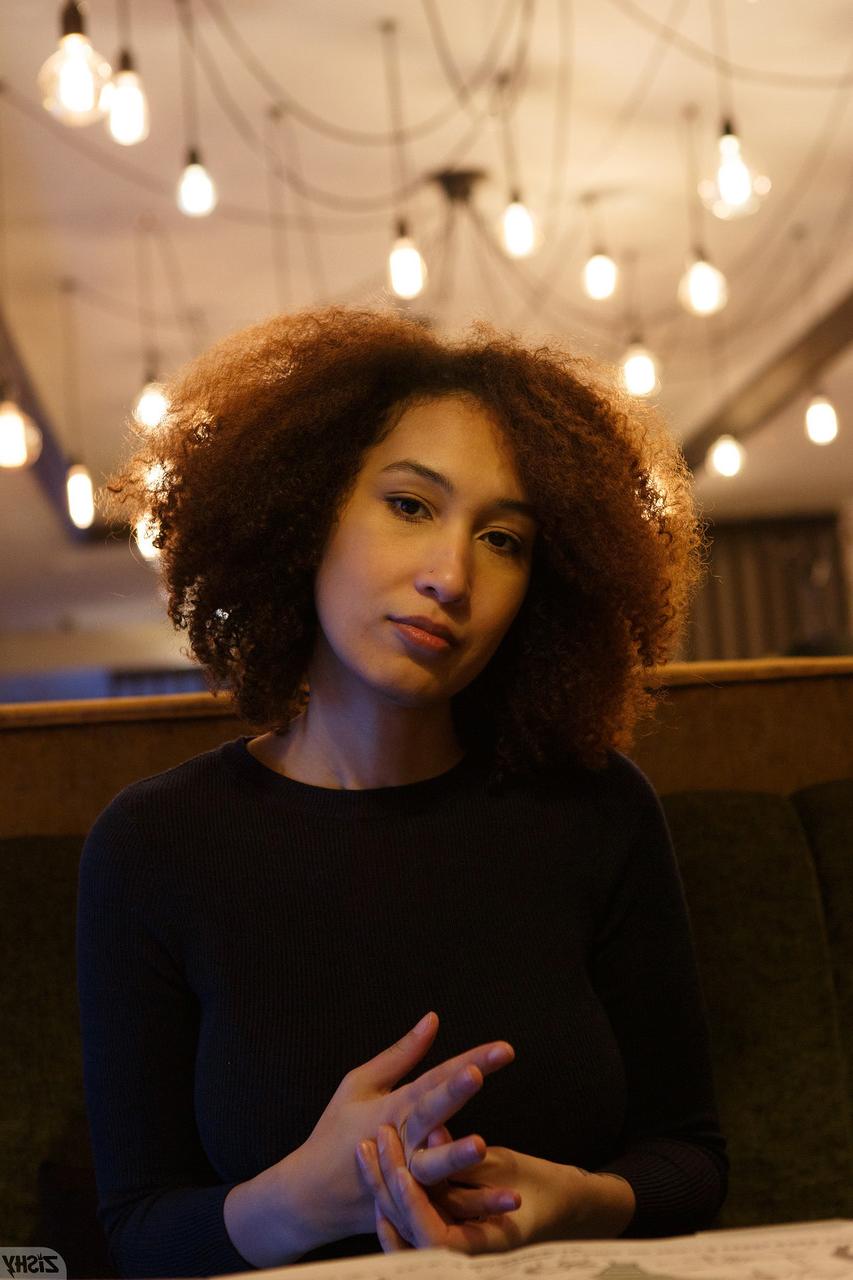 13P Curly haired babe Solana Bardell shows her natural tits & her hot ass