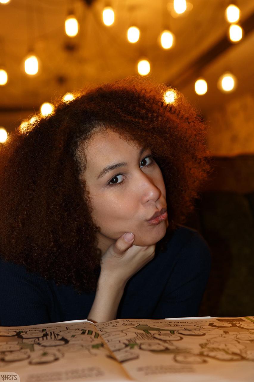 13P Curly haired babe Solana Bardell shows her natural tits & her hot ass