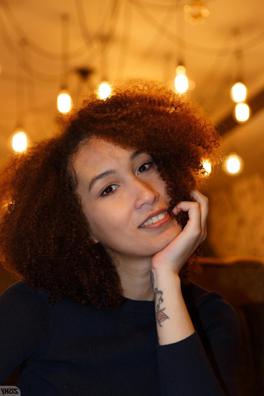 13P Curly haired babe Solana Bardell shows her natural tits & her hot ass