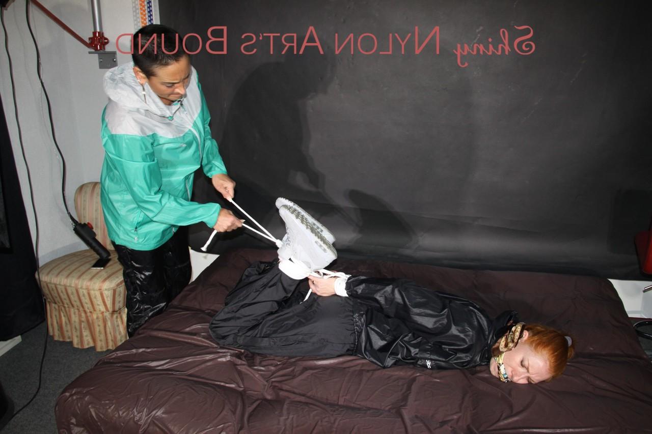 16P Natural redhead is left tied up and gagged by a fully clothed dyke