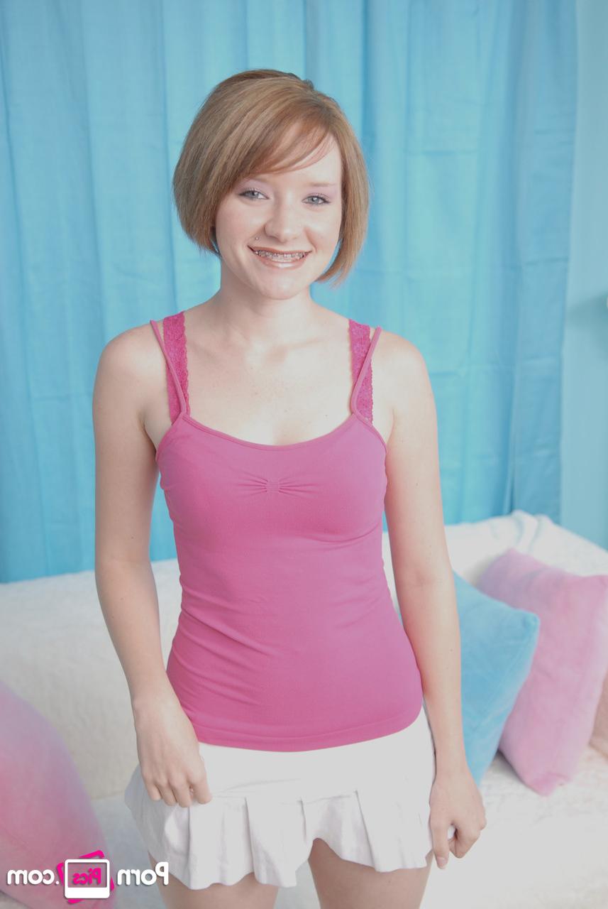20P Petite cutie with small boobs Faith Daniels shows off her body while stripping
