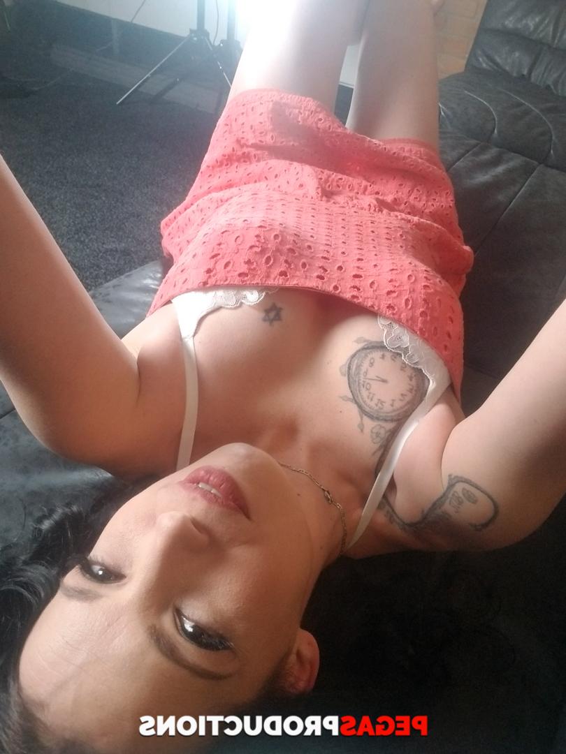 20P Inked brunette Nicky Madisson strips to her panties and teases her boyfriend