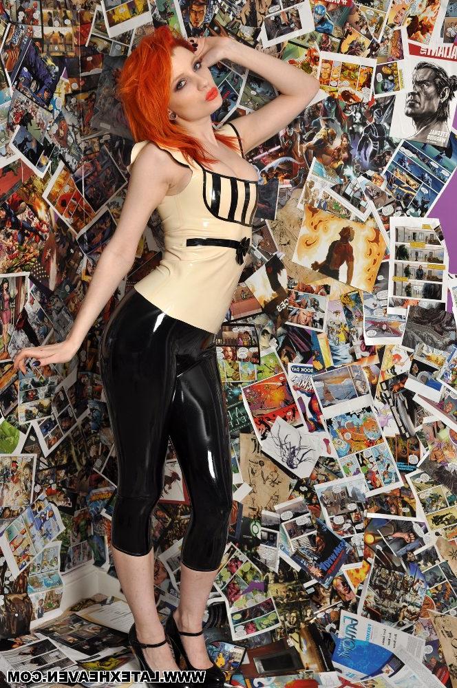 12P Pale redhead strikes provocative poses while wearing latex clothing