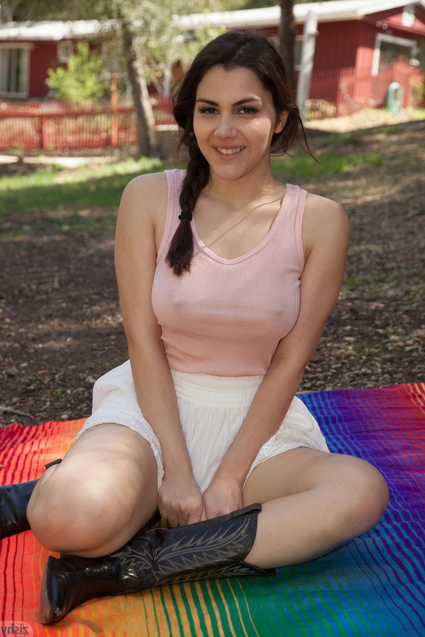 12P Italian hottie Valentina Nappi strips and poses in boots in the countryside