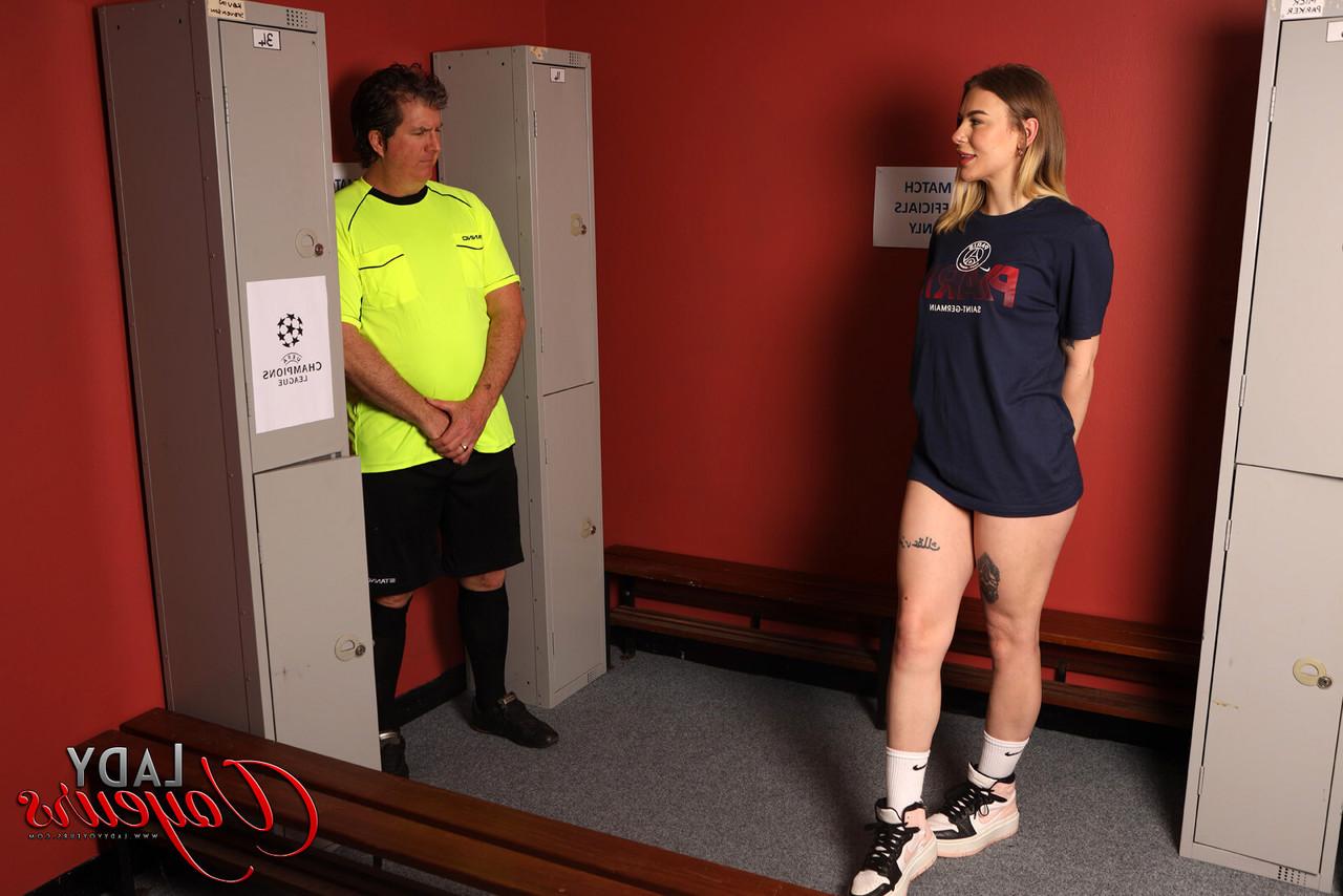 20P Tina Snow disrobes in a locker room while watching a man jack off