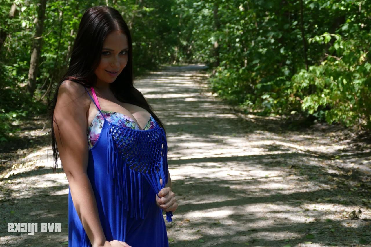 15P Redheaded Canadian Ava Nicks unveiling her round ass and big tits in nature