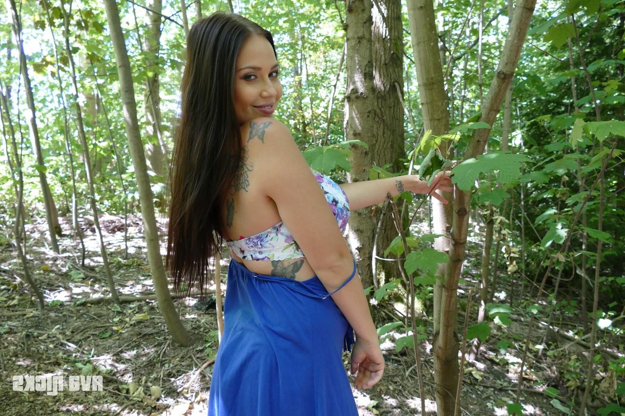 15P Redheaded Canadian Ava Nicks unveiling her round ass and big tits in nature