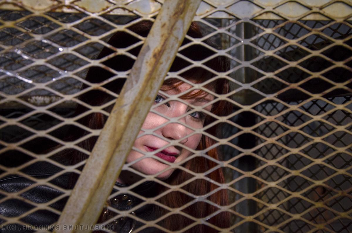 15P Naked redhead Elizabeth Thorn is tortured by other women while in bondage