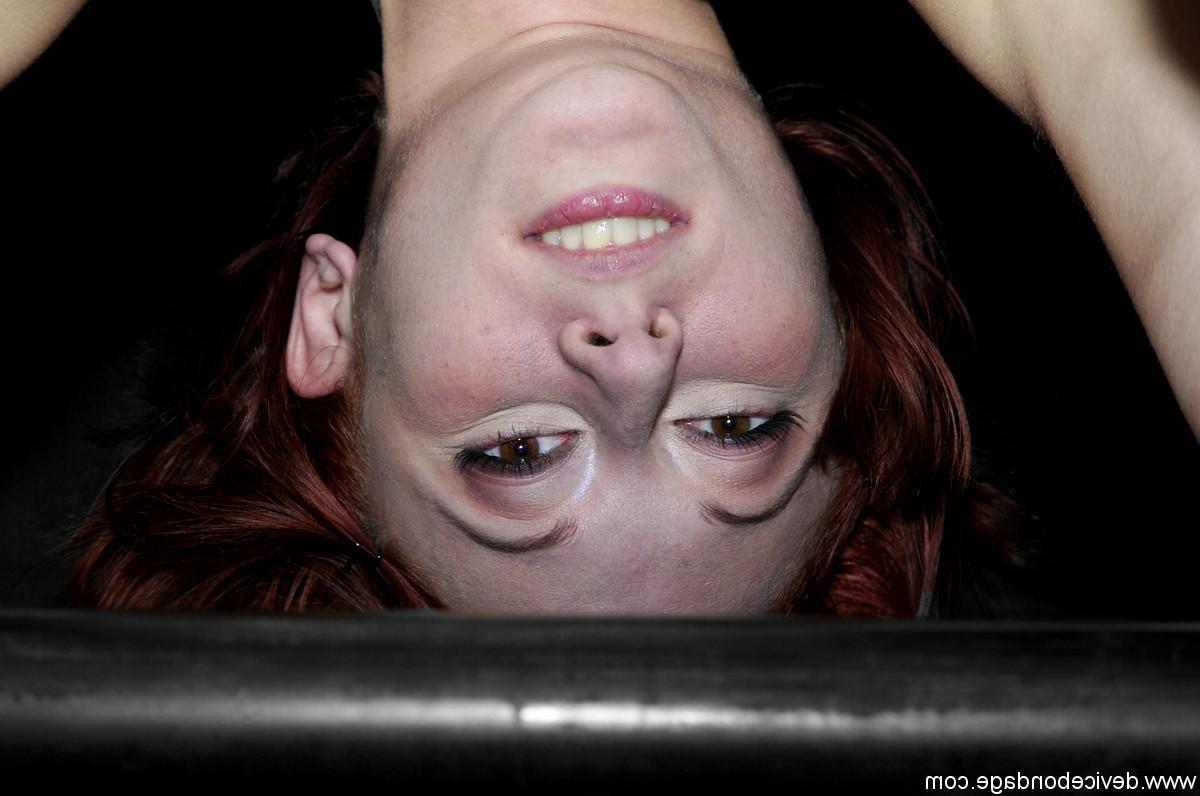 20P Redheaded submissive babe Sabrina Sparx gets cuffed and toyed by a dom