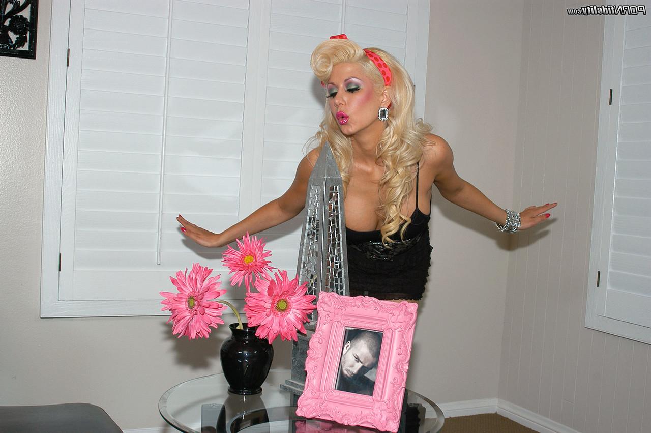 17P Blonde MILF Jazy Berlin cleans her home in provocative black outfit