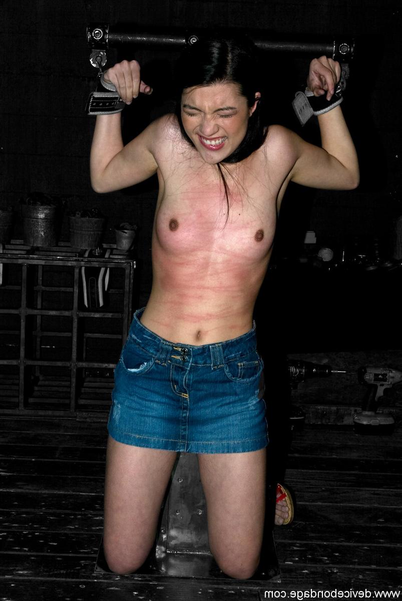 20P Dark-haired babe Circe Borges gets whipped and toyed while in metal bondage