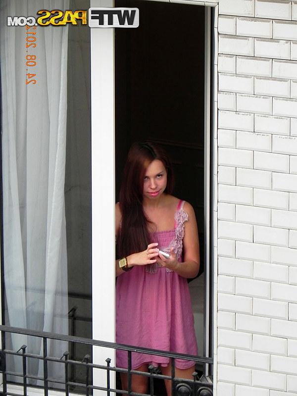 16P Redhead amateur model Anita flashes tits and ass in pink lingerie