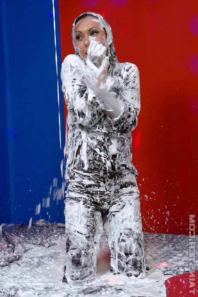 16P Pretty fully clothed fetish lady having some wet and messy fun