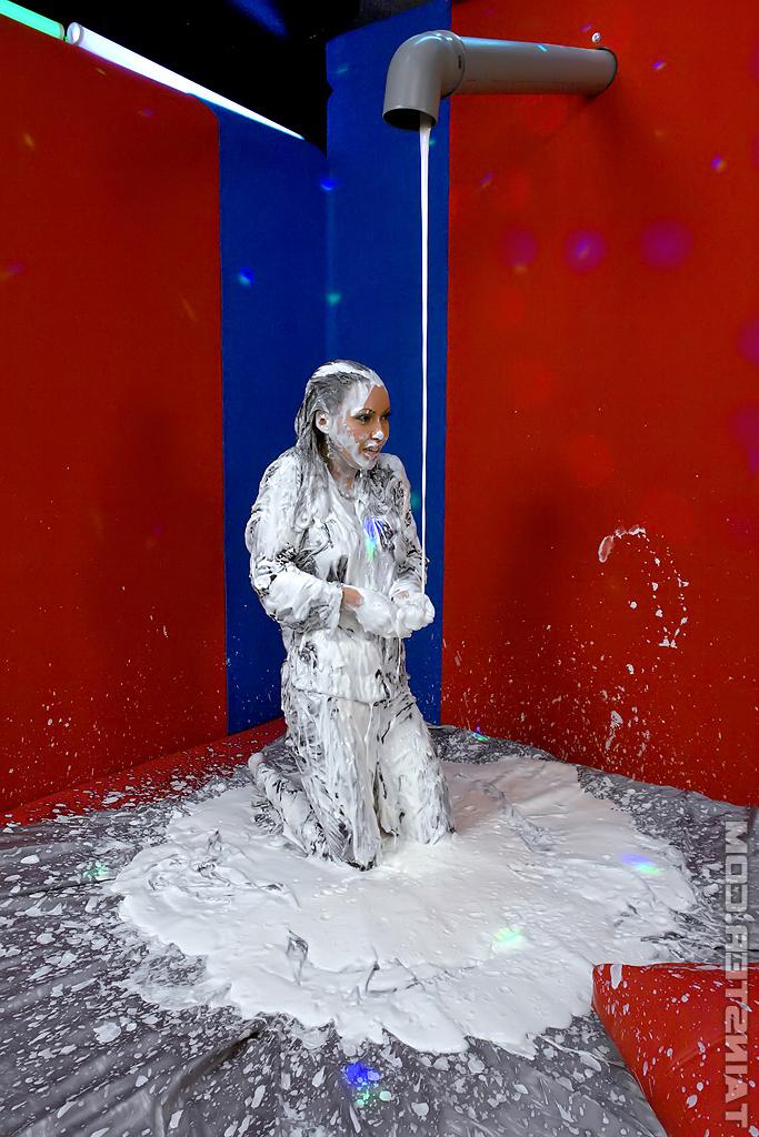 16P Pretty fully clothed fetish lady having some wet and messy fun