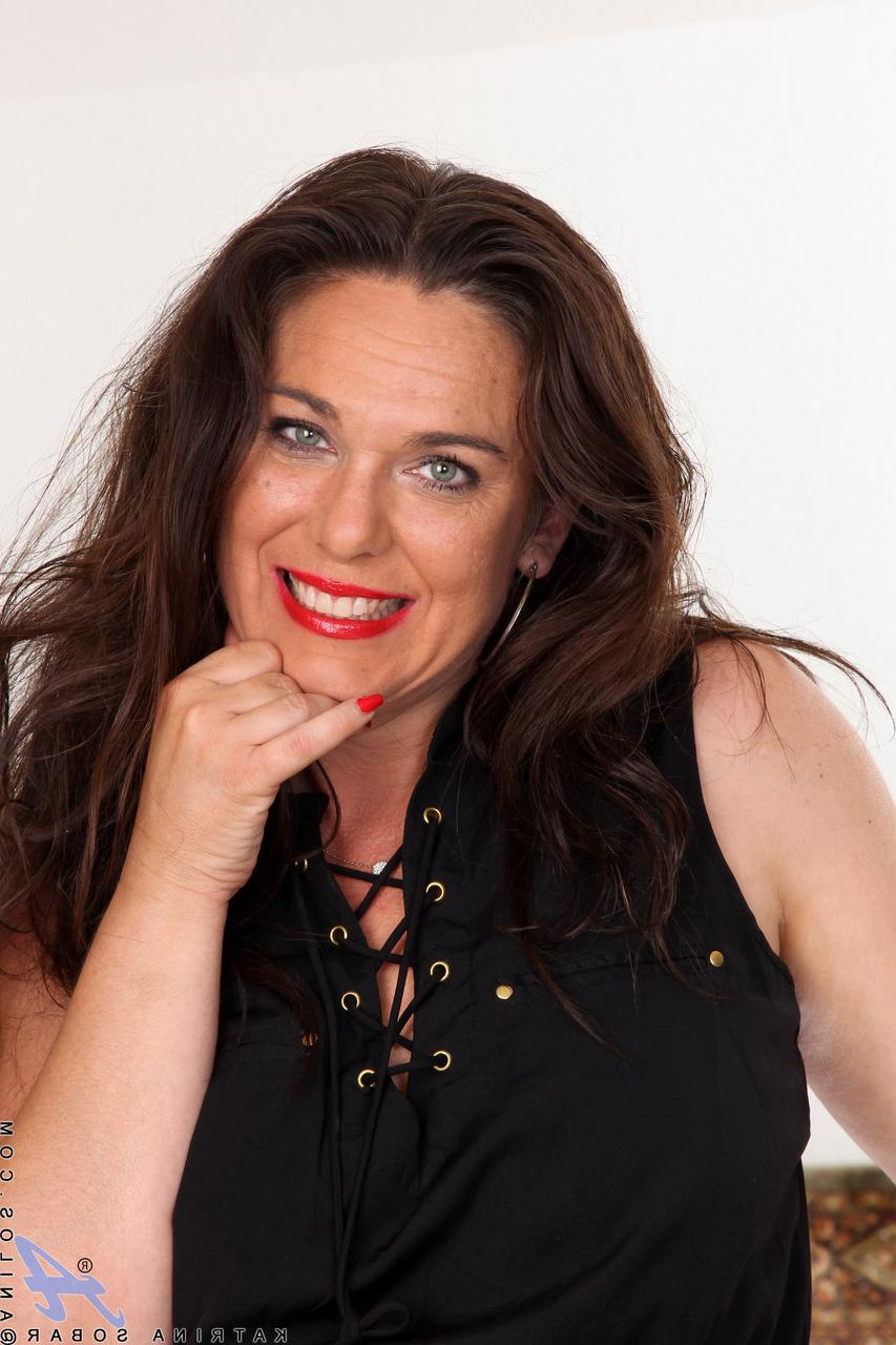 20P Chubby amateur MILF Katrina Sobar doffs her dress and lingerie and poses