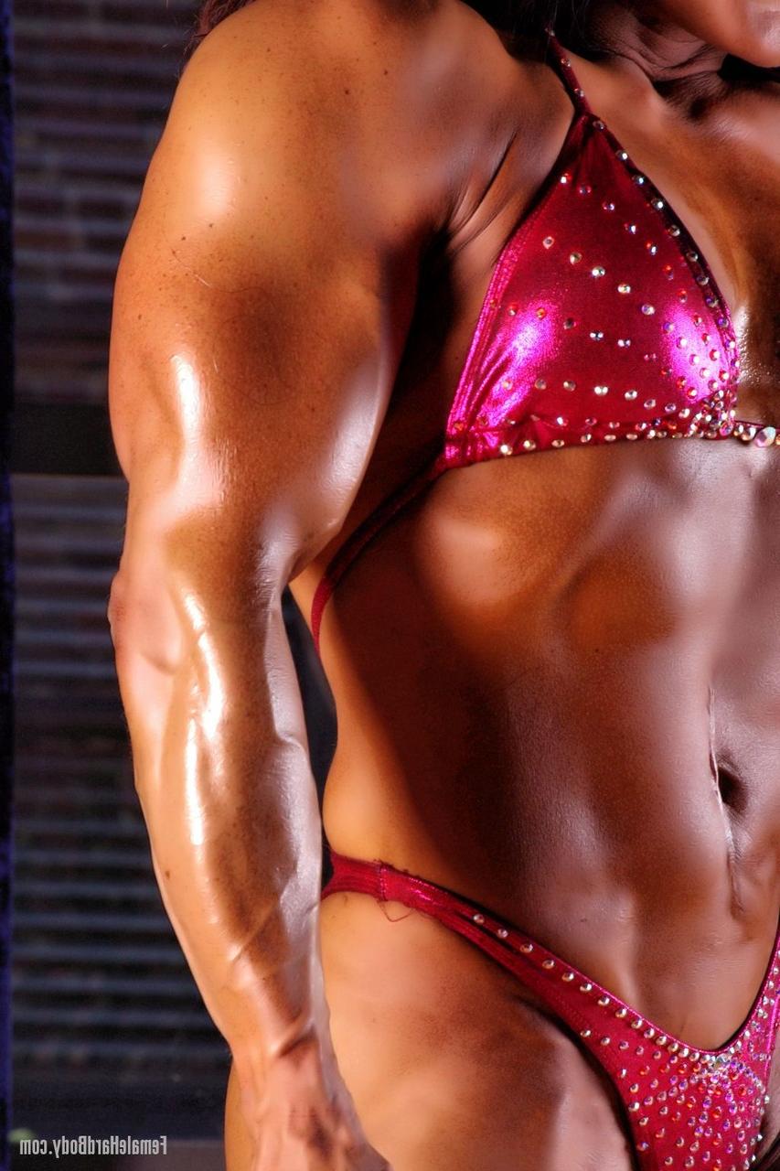 20P Bodybuilder Tonia Moore shows off her muscles wearing a sexy bikini