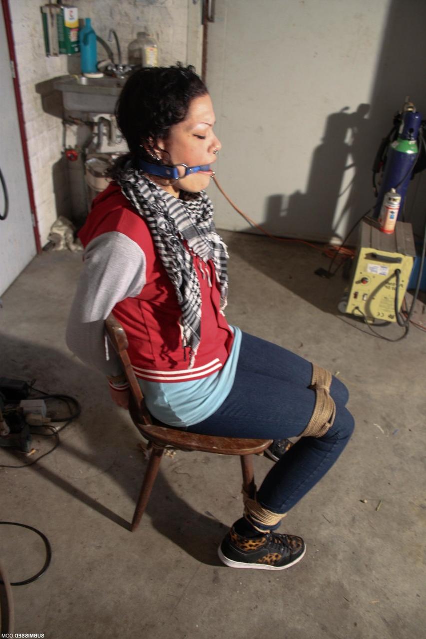 20P Clothed Czech MILF Steffi struggles while bound & ball-gagged in the garage