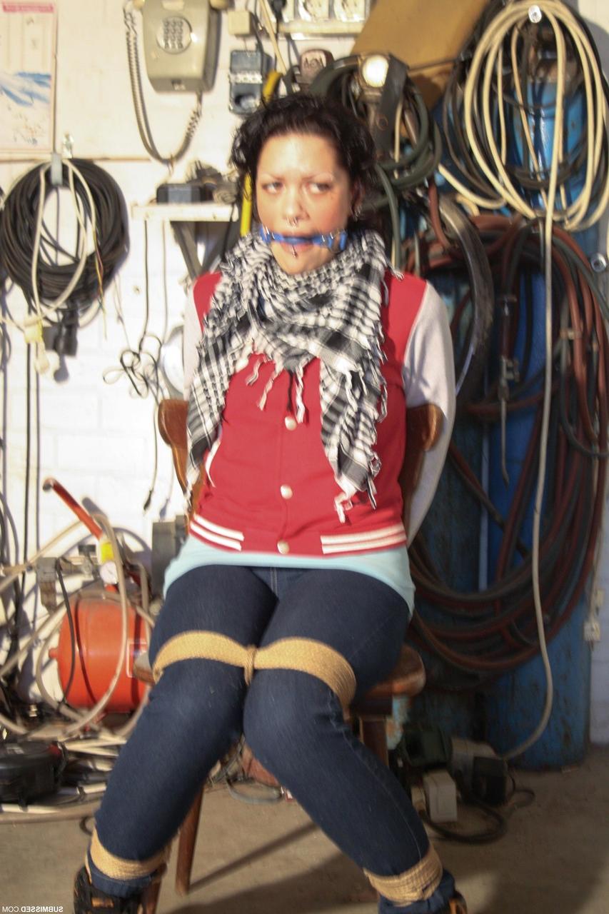 20P Clothed Czech MILF Steffi struggles while bound & ball-gagged in the garage