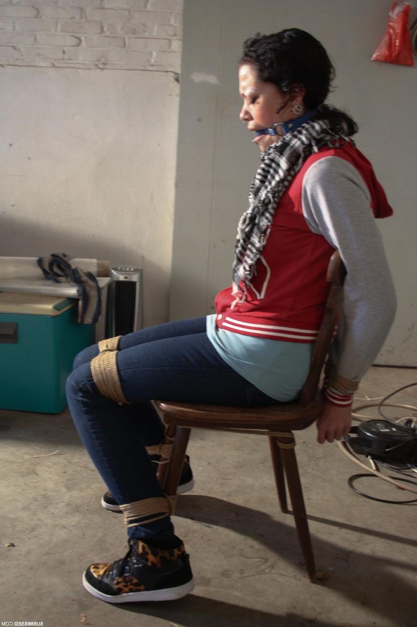 20P Clothed Czech MILF Steffi struggles while bound & ball-gagged in the garage