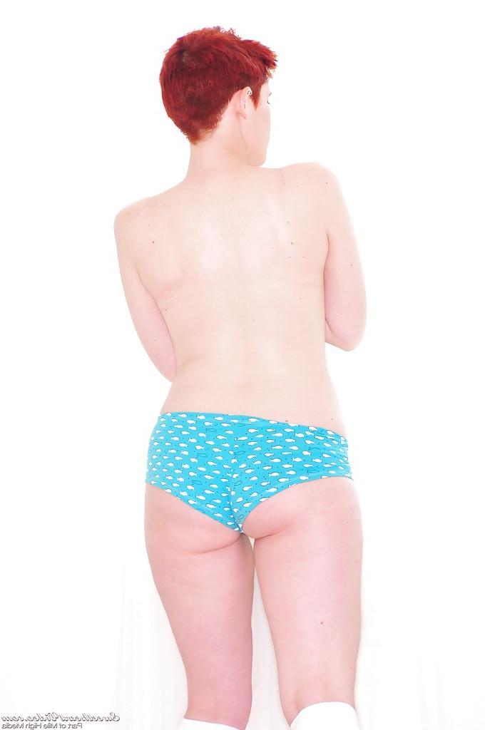 16P Filthy redhead chick with hairy cunt Lily Cade taking off her underwear